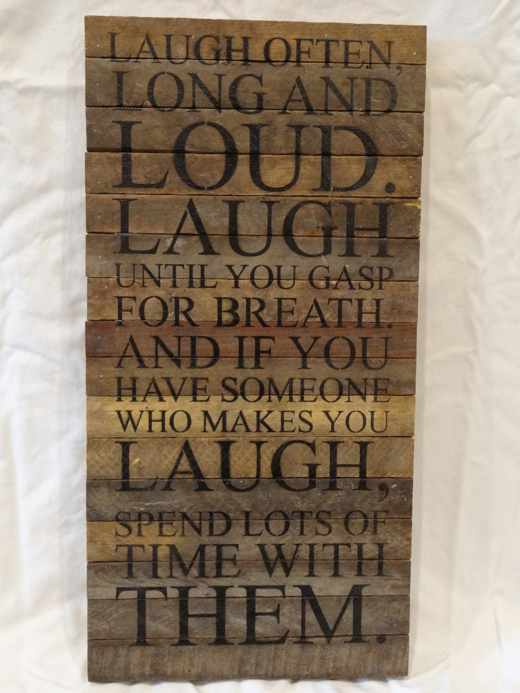 laugh often, long and loud