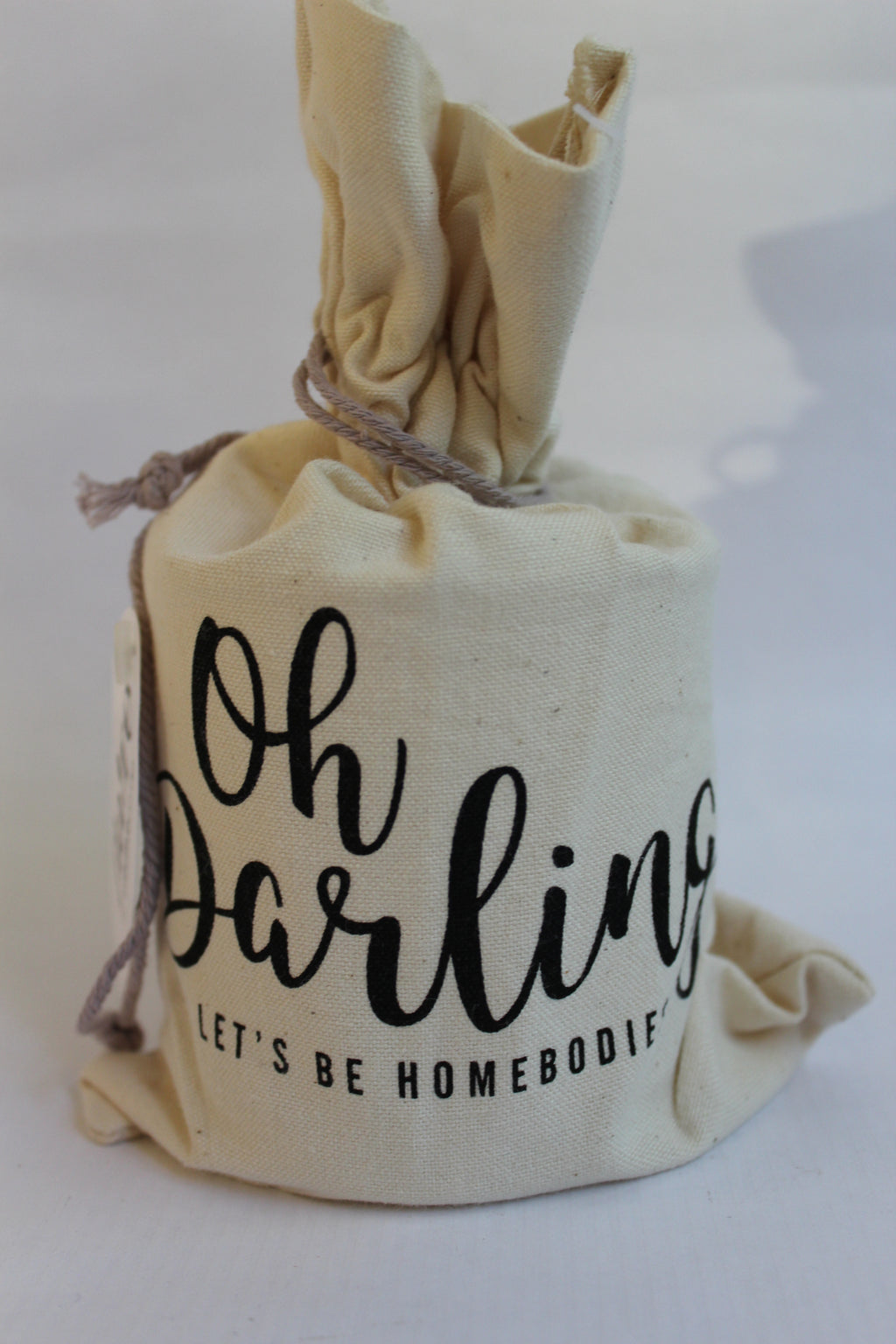 glass candle in canvas bag - homebodies