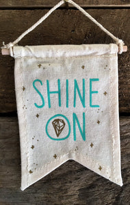 shine on small banner